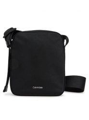 Calvin Klein Saszetka Ck Ease Reporter S K50K512886 Czarny. Czarne saszetki męskie CALVIN KLEIN, z materiału. Za 189.99 zł.