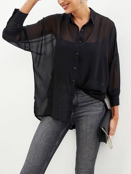 LA Angels Bluzka w kolorze czarnym rozmiar: L. Czarne bluzki damskie LA Angels, l, bez wzorów, bez kołnierzyka, bez ramiączek. Za 109.78 zł.