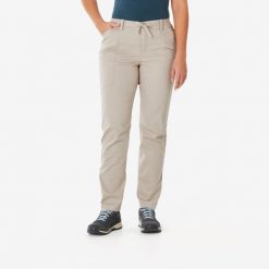 Spodnie turystyczne damskie Quechua NH500 Regular. Brązowe spodnie materiałowe damskie QUECHUA, bez wzorów, z elastanu, sportowe. Za 119.99 zł.