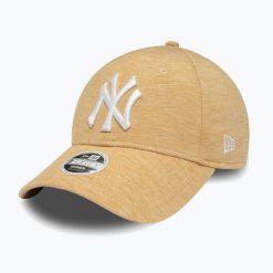 Czapka z daszkiem damska New Era Jersey 9Forty New York Yankees. Brązowe czapki z daszkiem damskie New Era, bez wzorów, z jersey. Za 109.99 zł.