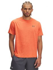 Under Armour Koszulka sportowa "Tech" w kolorze pomarańczowym rozmiar: M. Pomarańczowe t-shirty sportowe męskie Under Armour, m, z materiału, bez ramiączek, outdoorowe. Za 109.78 zł.