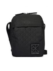 Calvin Klein Saszetka Utility Emblem Reporter LV04D3303G Czarny. Czarne saszetki męskie CALVIN KLEIN, z materiału. Za 329.99 zł.