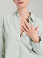 Bawełniana koszula oxford - zielony. Zielone koszule damskie Sinsay, l, bez wzorów, z bawełny, bez kołnierzyka, bez ramiączek. Za 49.99 zł.