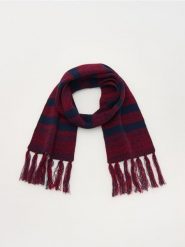 Dzianinowy szalik z frędzlami - granatowy. Niebieskie szaliki dziecięce Reserved, z dzianiny, bez ramiączek. W wyprzedaży za 9.99 zł.