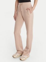 Guess Spodnie dresowe V3RB21 K7UW2 Beżowy Regular Fit. Brązowe spodnie dresowe damskie Guess, s, z aplikacjami, z dresówki. Za 399.99 zł.