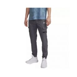 Spodnie dresowe Under Armour TECH UTILITY WOVEN. Szare spodnie sportowe męskie Under Armour, z dresówki. Za 379.10 zł.