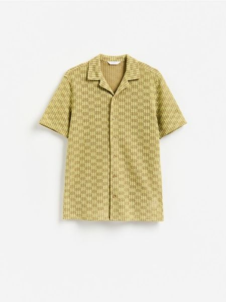 Ażurowa koszula regular - wielobarwny. Koszule męskie Reserved, l, w ażurowe wzory, z bawełny, bez kołnierzyka, bez ramiączek. Za 139.99 zł.