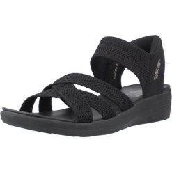 Sandały SKECHERS SLIP-INS ARYA Czarny. Czarne sandały damskie Skechers, bez wzorów, z materiału, bez obcasa. Za 390.00 zł.