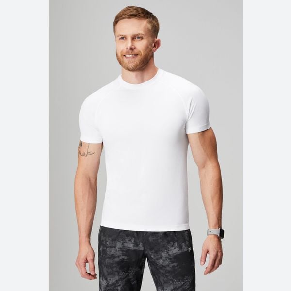 FABLETICS Koszulka Męska Sportowa Treningowa Bezszwowa Training Day. Białe t-shirty sportowe męskie FABLETICS, l, z materiału, bez ramiączek, na fitness i siłownię. Za 219.99 zł.