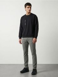 Bawełniane jeansy slim fit - zielony. Zielone jeansy męskie Sinsay. Za 79.99 zł.