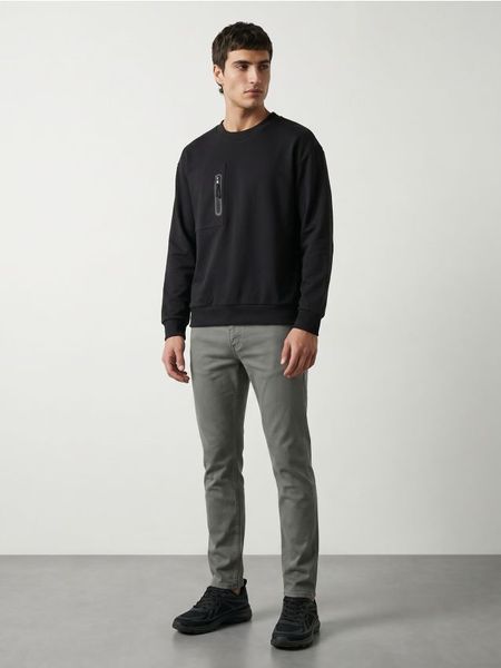 Bawełniane jeansy slim fit - zielony. Zielone jeansy męskie Sinsay. Za 79.99 zł.