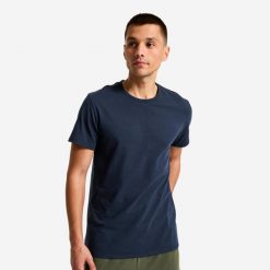 Koszulka sportowa męska Domyos. Niebieskie t-shirty sportowe męskie DOMYOS, l, z bawełny, bez ramiączek, na fitness i siłownię. Za 12.49 zł.
