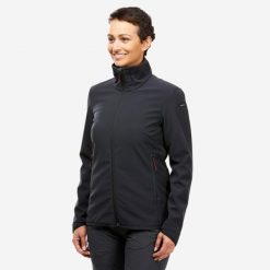Kurtka turystyczna damska Softshell Forclaz MT100. Czarne kurtki damskie FORCLAZ, m, bez wzorów, z polaru, bez kaptura. Za 199.99 zł.
