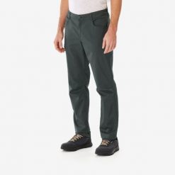 Spodnie turystyczne męskie Quechua NH100. Brązowe spodnie materiałowe męskie QUECHUA, bez wzorów, z bawełny, sportowe. Za 59.99 zł.
