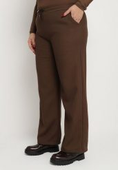 Brązowe Ocieplane Spodnie Dresowe z Szeroką Nogawką i Wysokim Stanem Sevissa. Brązowe spodnie dresowe damskie Born2be, plus size, bez wzorów, z dresówki. Za 44.99 zł.