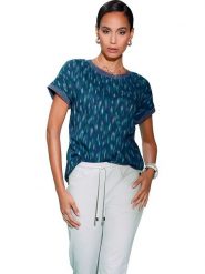 Heine Bluzka w kolorze niebiesko-zielonym rozmiar: 42. Niebieskie bluzki damskie Heine, bez wzorów, z wiskozy, bez kołnierzyka, bez ramiączek. Za 48.05 zł.