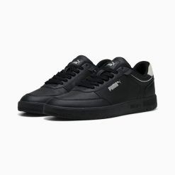 Puma Buty Canasta 40313802. Czarne buty sportowe na co dzień męskie Puma, z syntetyku, bez zapięcia, trekkingowe. Za 211.99 zł.