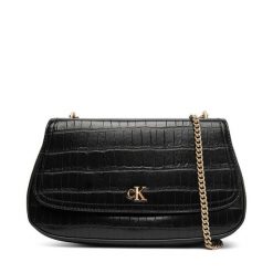 Torebka Calvin Klein. Czarne torebki wieczorowe CALVIN KLEIN, bez wzorów, wizytowe, bez kołnierzyka, bez ramiączek. Za 559.99 zł.