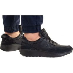 Buty Nike Waffle Debut DH9522-002 czarne. Czarne buty sportowe na co dzień męskie z gumy, bez zapięcia. W wyprzedaży za 486.89 zł.