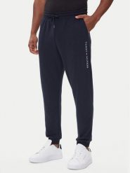 Tommy Hilfiger Spodnie dresowe UM0UM03664 Granatowy Regular Fit. Niebieskie spodnie dresowe męskie Tommy Hilfiger, bez wzorów, z bawełny. Za 269.99 zł.