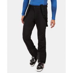 Męskie spodnie narciarskie softshell Kilpi RHEA-M. Czarne spodnie materiałowe męskie Kilpi, bez wzorów, z softshellu, sportowe. Za 520.17 zł.