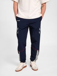 Spodnie do biegania Hummel World 26. Niebieskie spodnie sportowe damskie HUMMEL, l, z dresówki, do biegania. Za 249.00 zł.