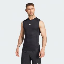 Kompresyjna koszulka treningowa bez rękawów TECHFIT. Czarne t-shirty sportowe męskie Adidas, z materiału, bez ramiączek, techfit (adidas). Za 211.00 zł.