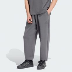 Spodnie Soft Lux. Czarne spodnie materiałowe męskie Adidas, bez wzorów, z bawełny, eleganckie, z standardowym stanem. Za 329.00 zł.
