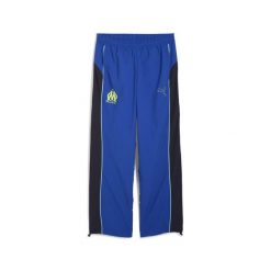 Męskie spodnie FtblEssentials Cellerator Olympique Marsylia PUMA. Niebieskie spodnie materiałowe męskie Puma, bez wzorów, z materiału. Za 330.70 zł.
