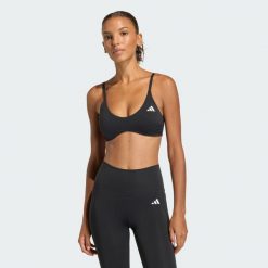 Biustonosz Optime Essentials Workout Light Support. Czarne biustonosze sportowe damskie Adidas, bez wzorów, z elastanu. Za 211.60 zł.