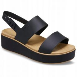 Sandały Dla Dorosłych Crocs Brooklyn Matte Wrap Low Wedge Sandal. Brązowe sandały damskie Crocs, bez wzorów, z materiału, bez obcasa, na koturnie. Za 259.99 zł.