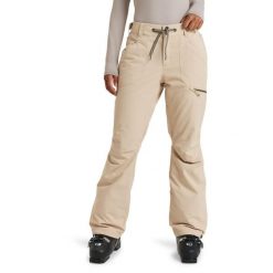 Spodnie snowboardowe damskie ROXY Nadia. Brązowe spodnie materiałowe damskie Roxy, bez wzorów, sportowe. Za 629.99 zł.