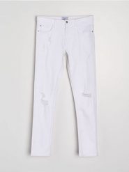 Jeansy slim fit z przetarciami - biały. Białe jeansy męskie Sinsay. Za 69.99 zł.