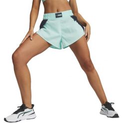 Spodenki Puma Fit Fashion Woven Flow Short, Kobiety. Niebieskie szorty damskie Puma, bez wzorów, z poliesteru, sportowe. Za 290.00 zł.