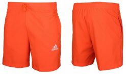 Spodenki męskie adidas SL Essentials Chelsea. Brązowe szorty męskie Adidas, z materiału, bez kołnierzyka. Za 81.99 zł.