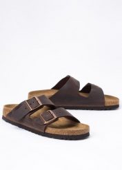 Klapki damskie brązowe BIRKENSTOCK ARIZONA LEO. Brązowe klapki damskie Birkenstock, bez wzorów, bez obcasa. Za 439.99 zł.