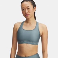 Biustonosz Under Armour Crossback Mid. Niebieskie biustonosze sportowe damskie Under Armour, bez wzorów. Za 99.99 zł.