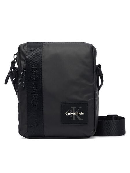 Calvin Klein Saszetka Rubberized Reporter LV04D3480G Czarny. Czarne saszetki męskie CALVIN KLEIN, z materiału. Za 329.99 zł.