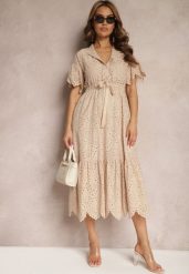 Beżowa Bawełniana Sukienka o Rozkloszowanym Kroju z Haftem z Guzikami i Gumką w Pasie Lovarae. Brązowe sukienki damskie Renee, l, bez wzorów, z bawełny, eleganckie, bez kołnierzyka, bez ramiączek, midi, rozkloszowane. W wyprzedaży za 146.99 zł.