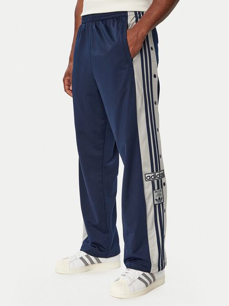 Adidas Spodnie dresowe Adibreak Classic KS7399 Granatowy Regular Fit. Niebieskie spodnie dresowe męskie Adidas, bez wzorów, z dresówki. Za 329.99 zł.