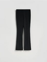 Legginsy z rozcięciami - czarny. Czarne legginsy damskie Reserved, l, bez wzorów, z dzianiny. Za 89.99 zł.
