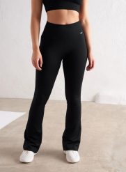 Damskie legginsy bezszwowe prążkowane rozszerzane wysoki stan squat proof czarne. Czarne legginsy damskie Aim'n, s, bez wzorów, z dzianiny. Za 296.00 zł.