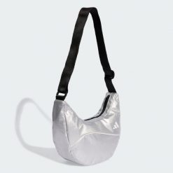 Torba na ramię adidas Glow. Białe torebki klasyczne damskie Adidas, bez wzorów, bez dodatków. Za 89.95 zł.