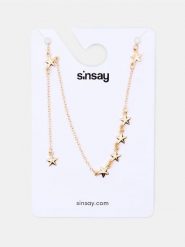 Naszyjnik z gwiazdkami - złoty. Żółte naszyjniki damskie Sinsay, złote. Za 9.99 zł.