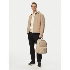 Plecak Calvin Klein Jeans. Brązowe plecaki męskie Calvin Klein Jeans, bez wzorów, z jeansu. Za 349.99 zł.