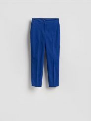 Spodnie w kant z bawełną - niebieski. Niebieskie spodnie materiałowe damskie Reserved, bez wzorów, z bawełny. Za 109.99 zł.