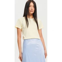 T-shirt z bawełny organicznej - Żółty. Żółte koszulki dziewczęce Reserved, l, bez wzorów, z bawełny, bez kołnierzyka. Za 79.99 zł.