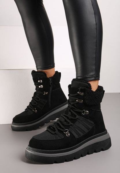 Czarne Traperki na Grubej Podeszwie Ozdobione Futerkiem Linthira. Czarne trapery damskie Born2be, z futra, bez obcasa. Za 79.99 zł.