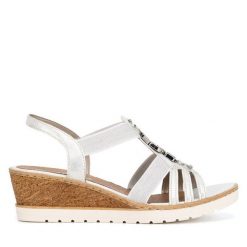 Sandały Remonte. Białe sandały damskie Remonte, bez wzorów, bez obcasa, na koturnie. Za 339.99 zł.
