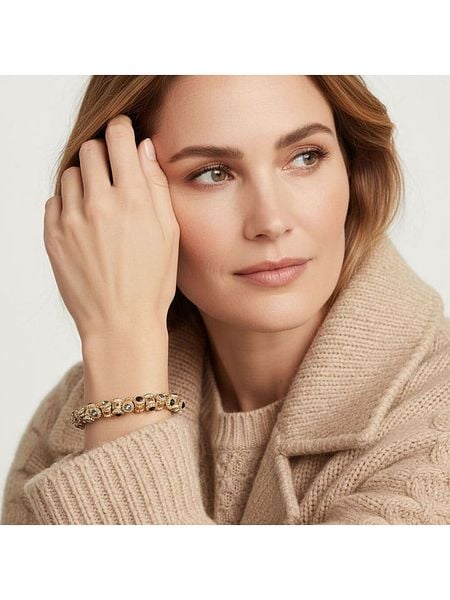 Otazu Pozłacana bransoletka z kryształami Swarovski rozmiar: onesize. Czarne bransoletki damskie Otazu, pozłacane. Za 174.43 zł.